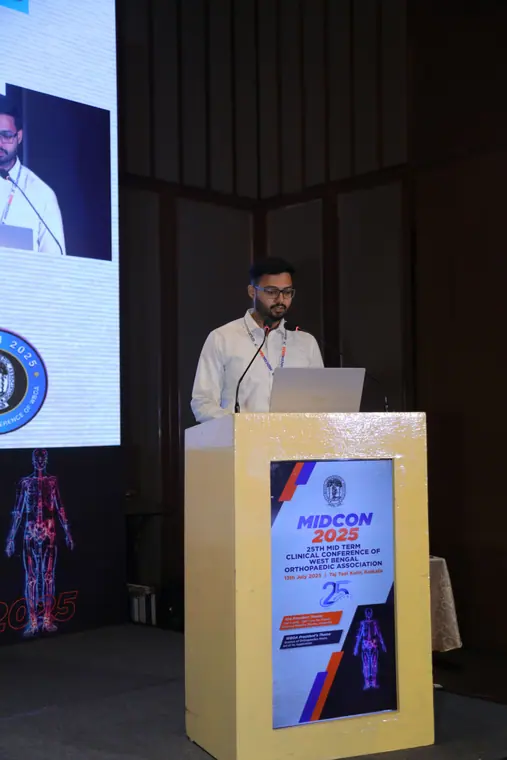 Dr. Mandar Deb at the podium at MIDCON 2025