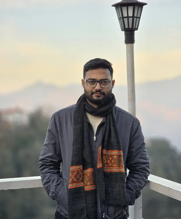 Dr. Mandar Deb outdoors in the hills